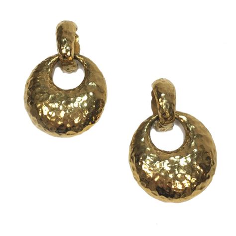 ysl boucle d'oreille|Boucles d'oreilles Yves Saint Laurent Doré en Métal .